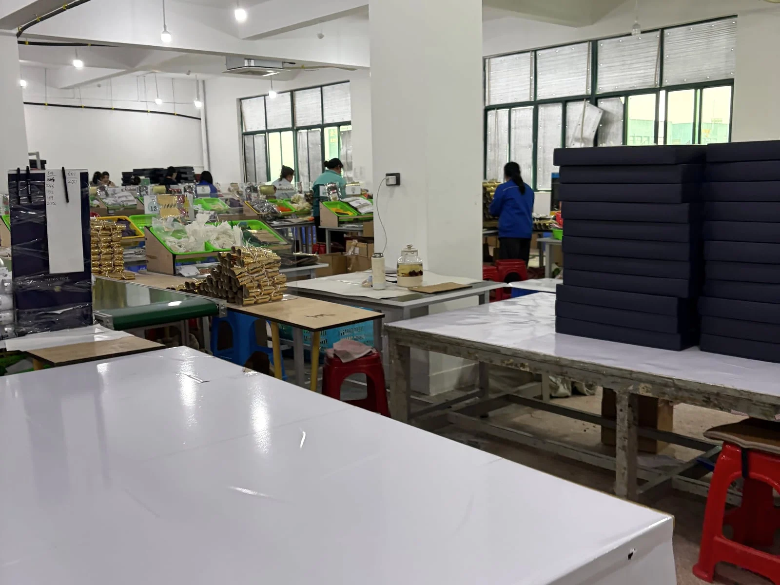 Organized Christmas cracker assembly workstations