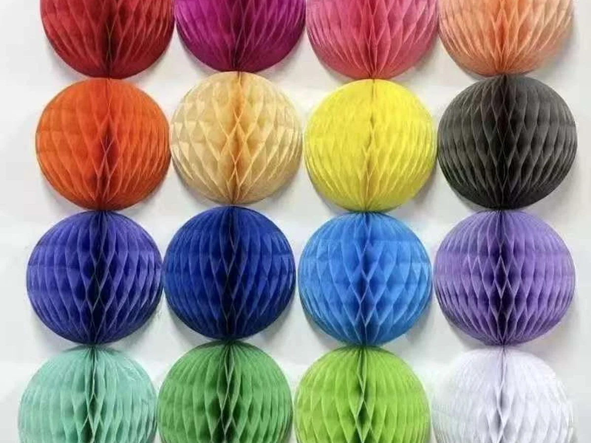 Colourful paper honeycomb decorations suitable as Christmas cracker fillers