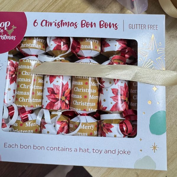 Rectangular window display box for Christmas crackers.